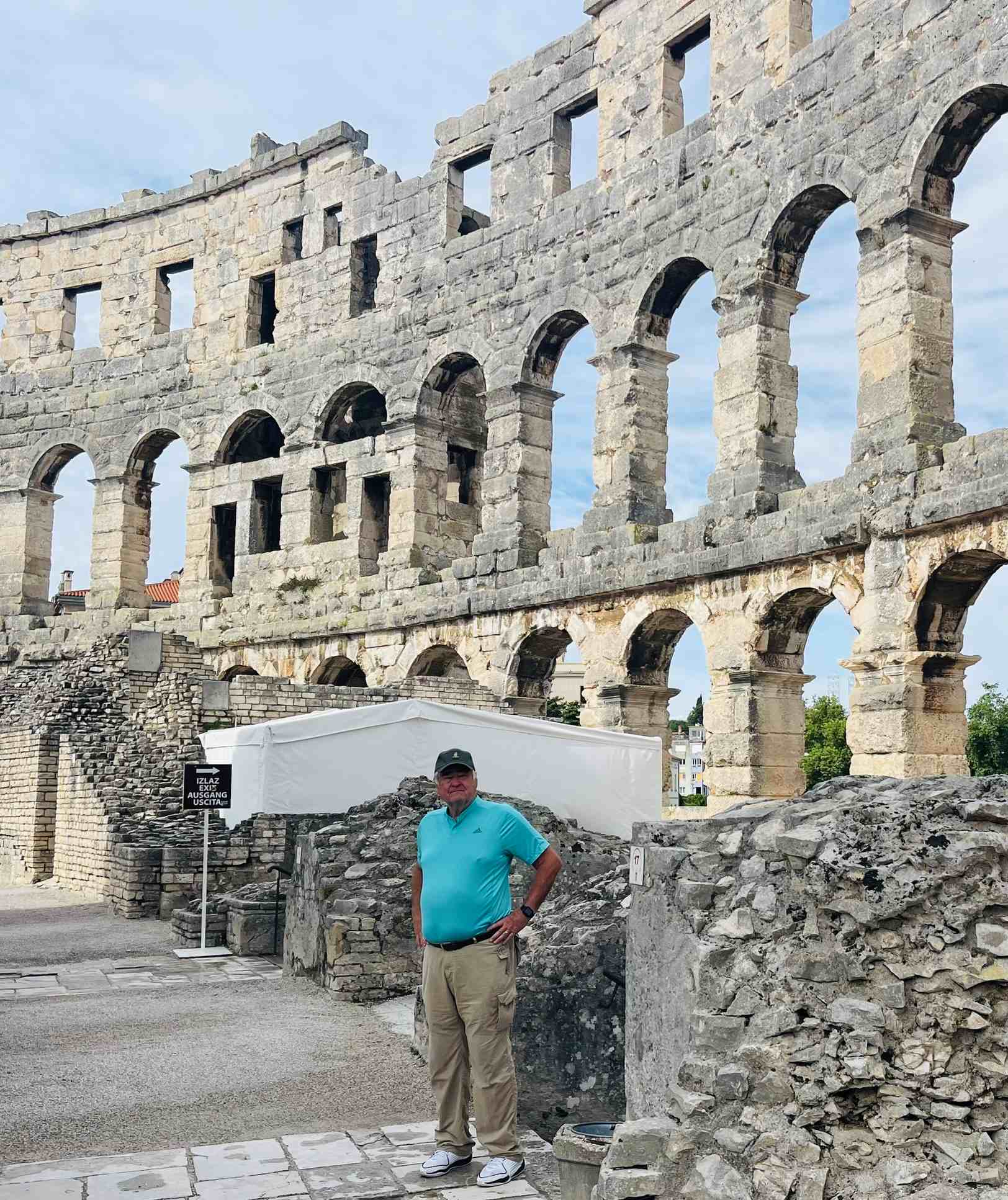 Paul standing in front of the Pulu Amphitheater in Croatia